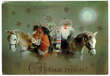 USSR - CIRCA 1982: Postcard printed in the USSR shows draw by Kypriyanov - Santa Claus manages three horses, circa 1982. Russian text: Happy New Year!のeditorial素材