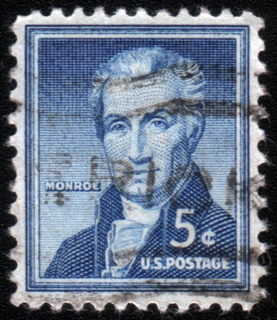 USA - CIRCA 1954: A stamp printed in the USA, shows the "Portrait of James Monroe", by Rembrandt Peale, circa 1954のeditorial素材