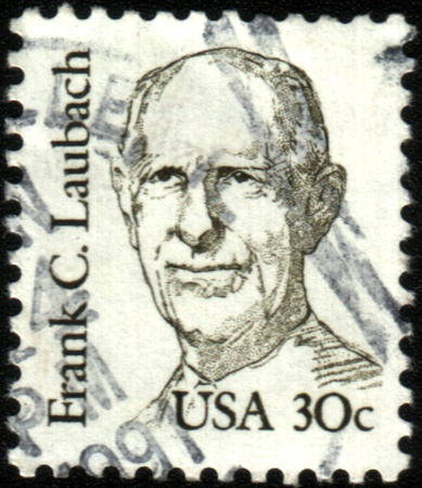 USA - CIRCA 1984: A stamp printed in the USA, shows Frank Charles Laubach, circa 1984のeditorial素材