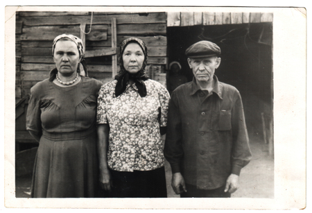 USSR  - CIRCA 1950s: An antique photo shows Two women and manのeditorial素材