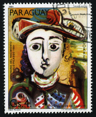 PARAGUAY - CIRCA 1981: A stamp printed in Paraguay show Pablo Picasso's painting "Seated Girl "(1970) , circa 1981.のeditorial素材