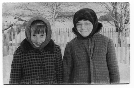  USSR - CIRCA 1969: An antique photo shows  portrait two girlのeditorial素材