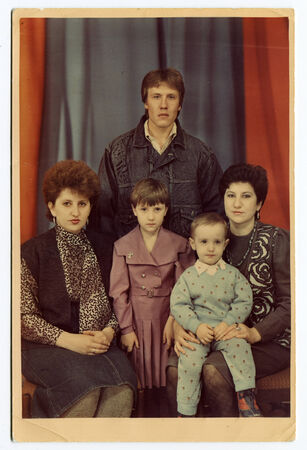 USSR - CIRCA 1987: An antique photo shows family portraitのeditorial素材