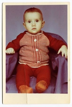 USSR - CIRCA 1990s : An antique photo shows studio portrait little girlのeditorial素材