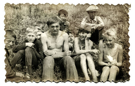 USSR - CIRCA 1970s : An antique photo shows happy children playing on the fieldのeditorial素材