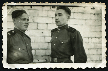 USSR - CIRCA 1953: An antique photo shows two soldersのeditorial素材