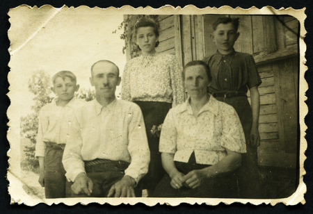 USSR - CIRCA 1953: An antique photo shows family portrait, 1953のeditorial素材