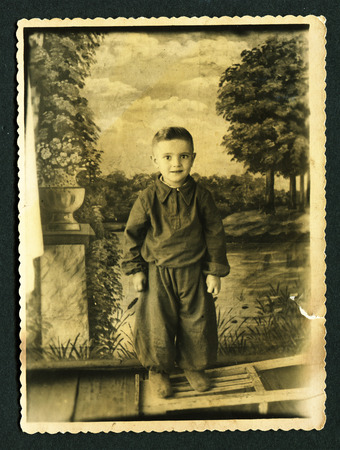 USSR - CIRCA 1951: Vintage photo shows studio portrait little boy, 1951のeditorial素材