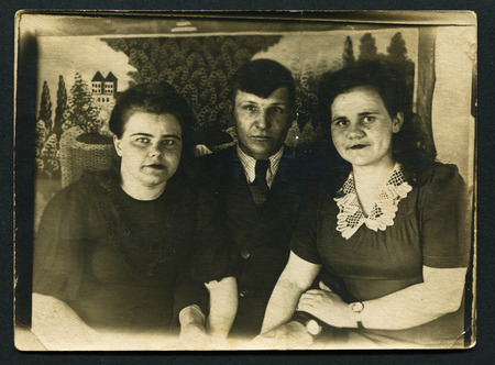 USSR - CIRCA 1953: An antique photo shows family portrait, 1953のeditorial素材