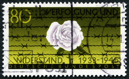 FEDERAL REPUBLIC OF GERMANY - CIRCA 1983: A stamp printed in the Federal Republic of Germany shows Rose and thorns, resistance (1933-1945), circa 1983のeditorial素材
