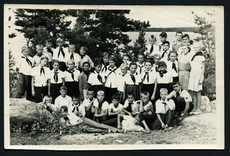 USSR - CIRCA 1960s: Vintage photo shows Pioneer detachment in a camp, 1960sのeditorial素材