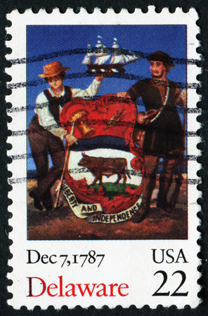UNITED STATES OF AMERICA - CIRCA 1987: A stamp printed in USA dedicated to Delaware, circa 1987のeditorial素材