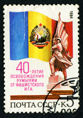 USSR - CIRCA 1984: Postage stamps printed in the USSR, dedicated to the 40 anniversary of the liberation of Romania from the Nazis, circa 1984のeditorial素材
