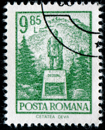 ROMANIA - CIRCA 1972: A stamp printed in Romania from the "Definitives I - Buildings" shows Decebal's statue, Cetatea Deva, circa 1972.のeditorial素材