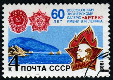 USSR - CIRCA 1985: A stamp printed in USSR commemorates the 60 anniversary of the Artec Pioneer Camps, circa 1985.のeditorial素材