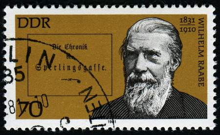 GERMANY- CIRCA 1981: stamp printed by Germany, shows Wilhelm Raabe, German Novelist and Poet, circa 1981.のeditorial素材