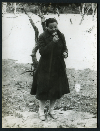 USSR - CIRCA 1980s: An antique photo show girl with a flower in the winter forestのeditorial素材
