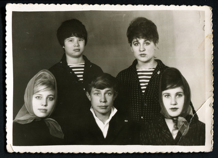 USSR - CIRCA 1980s: An antique photo show Group portrait of young peopleのeditorial素材
