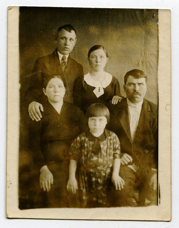 Ussr - CIRCA 1950s: An antique Black & White photo show family portraitのeditorial素材