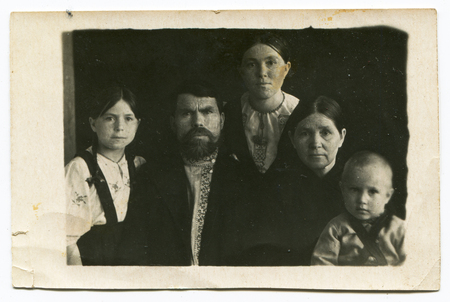 Ussr - CIRCA 1960s: An antique Black & White photo show family portraitのeditorial素材