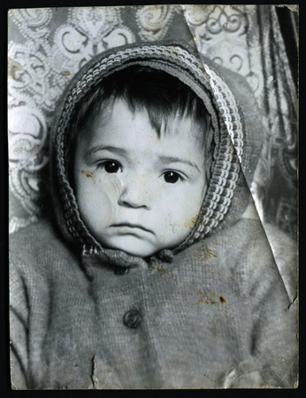 USSR - CIRCA 1970s: An antique photo show little girl in winter clothesのeditorial素材