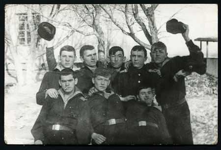 Ussr - CIRCA 1960s: An antique Black & White photo show portrait of a group of soldiersのeditorial素材