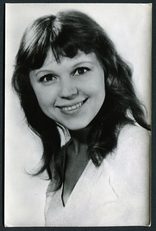 USSR - CIRCA 1970s: studio Portrait young woman with a lovely smile, circa 1970sのeditorial素材