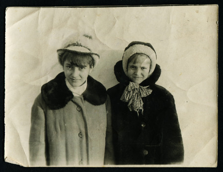 USSR - CIRCA 1960s: An antique photo shows portrait of two little girlのeditorial素材