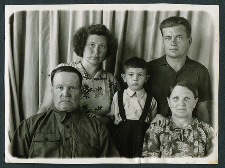 Ussr - CIRCA 1970s: An antique Black & White photo shows family portraitのeditorial素材