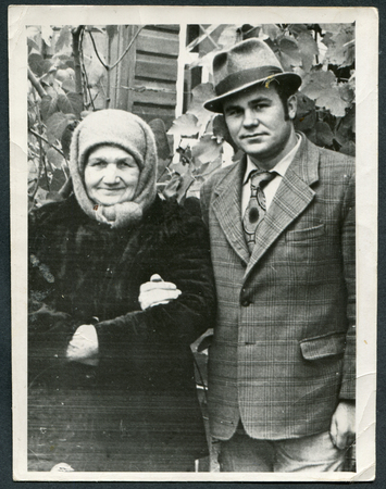 USSR - CIRCA 1960s: An antique photo shows old mother and middle age sonのeditorial素材