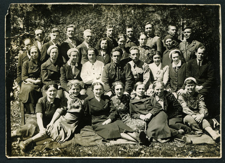 USSR - CIRCA 1920s: Antique photo shows group  people on the nature, USSR, 1920sのeditorial素材