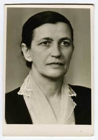 USSR - CIRCA 1950s: An antique photo show womanのeditorial素材