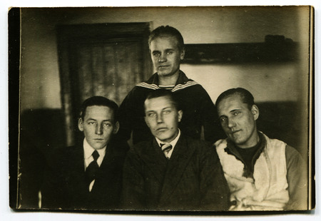 Ussr - CIRCA 1950s: An antique Black & White photo show family portraitのeditorial素材