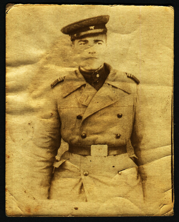 Ussr - CIRCA 1940s: An antique Black & White photo show portrait of soldierのeditorial素材