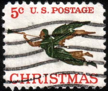 USA - CIRCA 1965 - This American Christmas postage stamp shows an 1840 weathervane (the angel Gabriel and horn) on the People's Methodist Church, Newburyport, Massachusetts.のeditorial素材