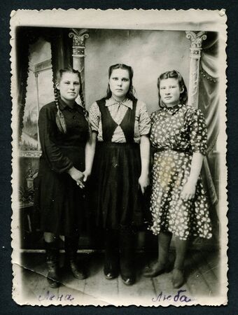 Ussr - CIRCA 1950s: An antique Black & White photo shows three young womenのeditorial素材