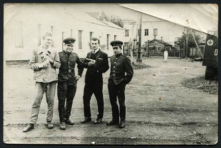 Ussr - CIRCA 1970s: An antique Black & White photo show four menのeditorial素材