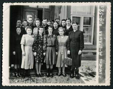 Ussr - CIRCA 1950s: An antique Black & White photo show Group travelers. Caption for photo: "Tyumen, Holiday House"のeditorial素材