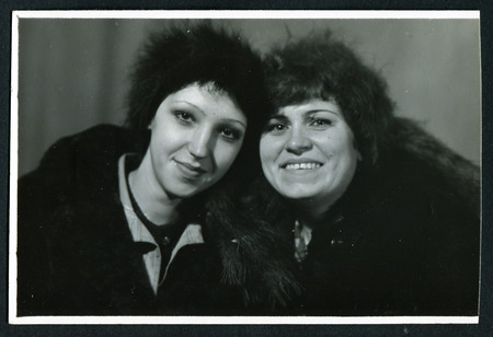 Ussr - CIRCA 1970s: An antique Black & White photo show portrait of two womenのeditorial素材