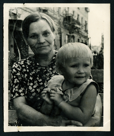 Ussr - CIRCA 1980s: An antique Black & White photo show mother and daughterのeditorial素材