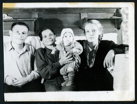 Ussr - CIRCA 1950s: An antique Black & White photo show family portraitのeditorial素材