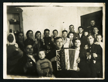 USSR - CIRCA 1950s An antique photo shows family, USSR, 1950sのeditorial素材