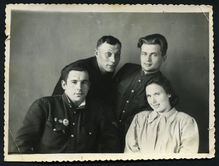 Ussr - CIRCA 1980s: An antique Black & White photo show studio group portraitのeditorial素材