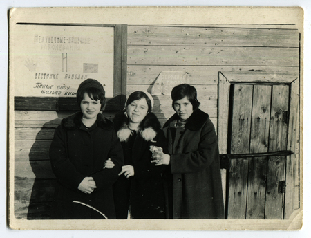 Ussr - CIRCA 1970s: An antique Black & White photo show Three young girlsのeditorial素材