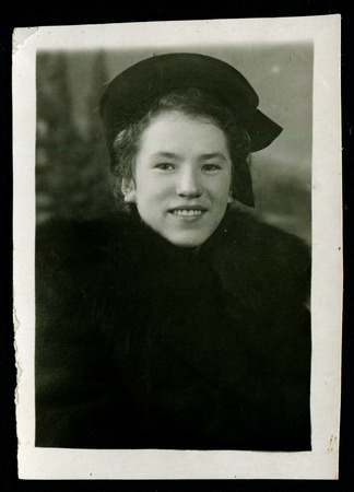 Ussr - CIRCA 1960s: An antique Black & White photo show group portrait of womanのeditorial素材