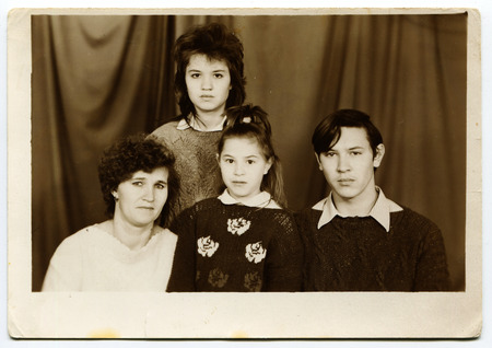 USSR - CIRCA 1980s : An antique photo shows studio family portrait