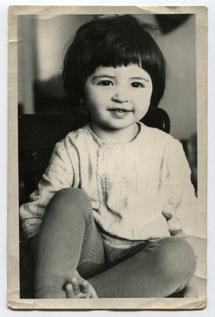 USSR - CIRCA 1980s: An antique photo show little girlのeditorial素材