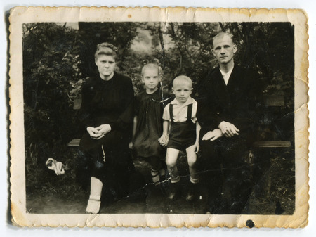 Ussr - CIRCA 1950s: An antique Black & White photo show family portrait