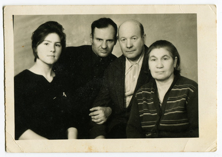 Ussr - CIRCA 1970s: An antique Black & White photo show studio family portrait