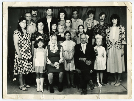 Ussr - CIRCA 1950s: An antique Black & White photo show big familyのeditorial素材